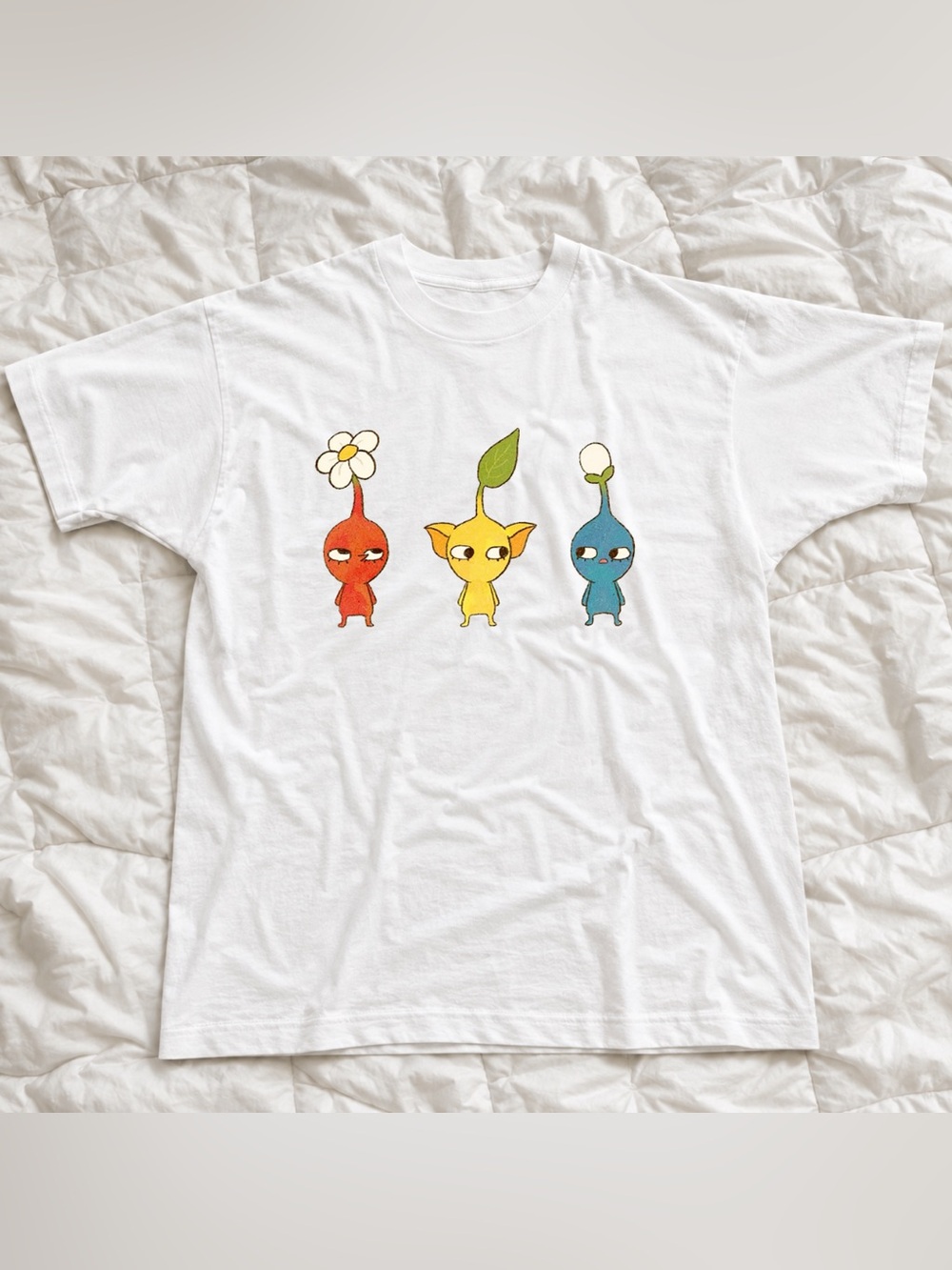 White Graphic Tee with Red, Yellow & Blue Pikmin Characters